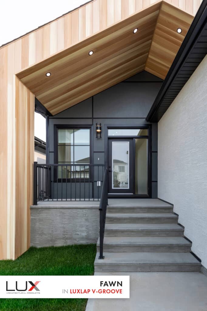 Modern house entrance with wooden paneling.